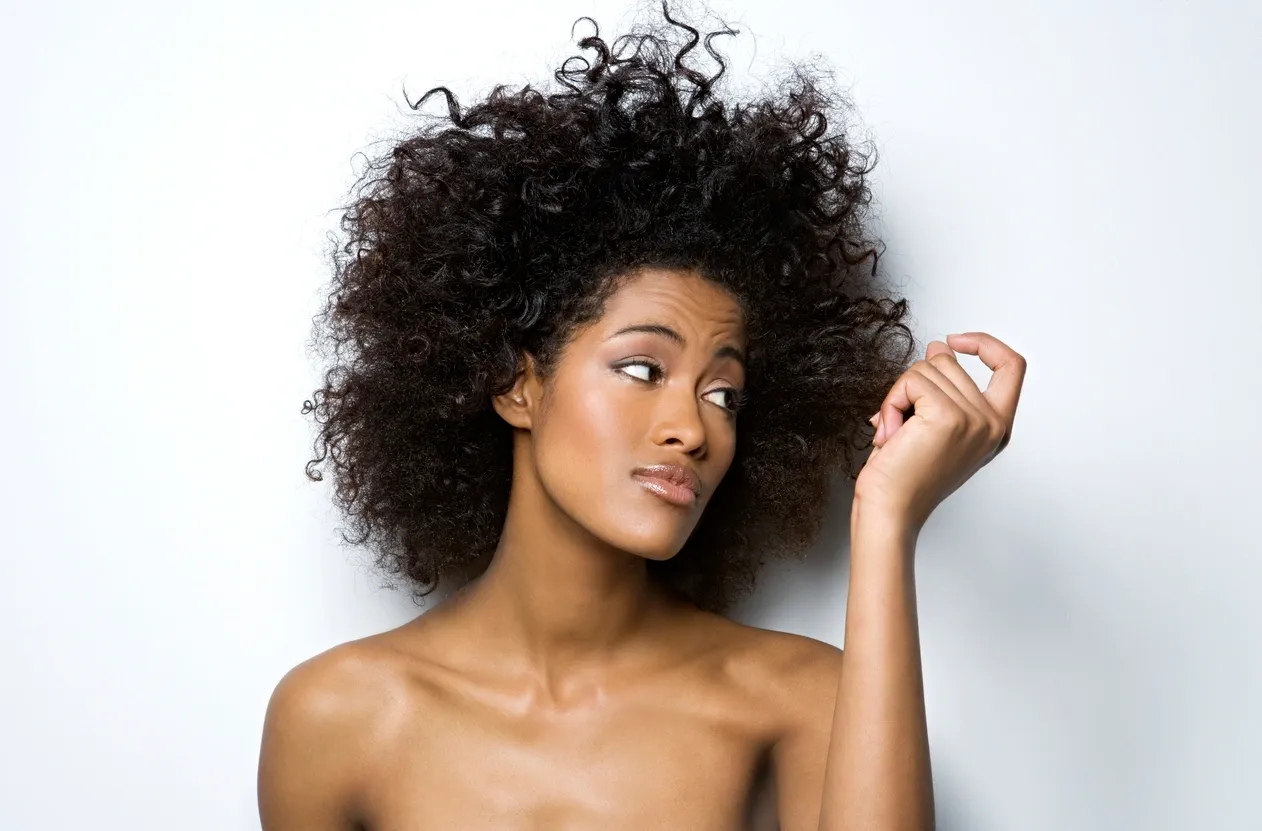 Does brushing your hair wet cause breakage?